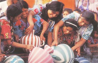 Kachikel women at well, Santiago, Atitlan, Guatemala